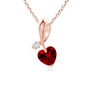 1 CT. Heart-Shaped Ruby Ribbon Pendant with Diamond